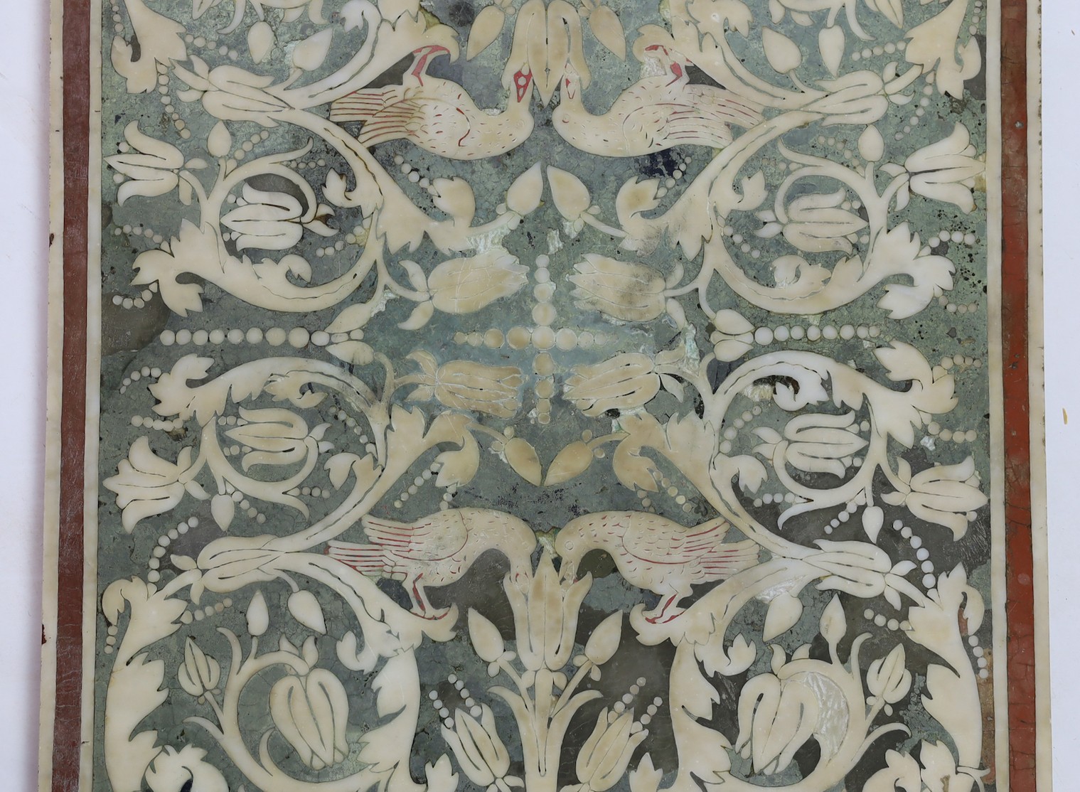 A 17th/18th century Florentine scagliola table top, 122 x 59.5cm, depth 2.25cm